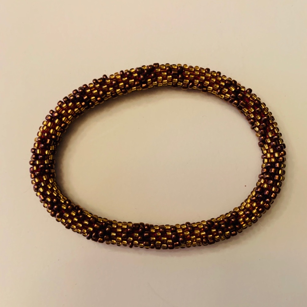 Gold “Aid Through Trade” Beaded Bracelet